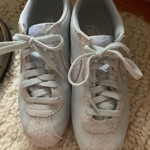 Light blue and snakeskin Nike sneakers